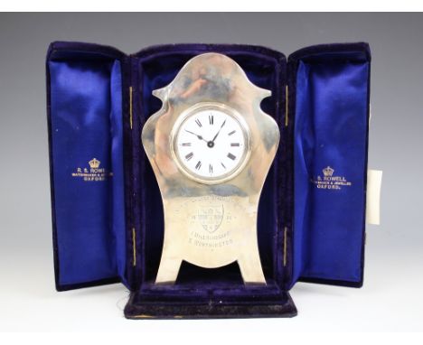 An Edwardian silver mounted mantle clock, Lawrence Emanuel, Birmingham 1902, the circular enamel white dial with Roman numera