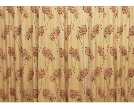 * A pair of interlined floral pattern curtains, in red and green colourways upon an ivory coloured ground, height to rail 282