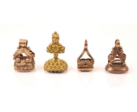 A selection of four late 19th century seal fobs, to include a quartz seal fob example, the intaglio engraved ‘Be wise to day’