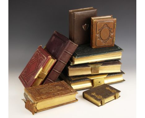 A collection of nine photo albums of various sizes, each containing a quality of Victorian portrait cards, majority late 19th