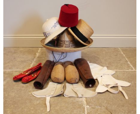 A selection of costume related items, a Dixon &amp; Oldham pith helmet, size 7 1/8, a fez, a sombrero, straw sun hat, Chinese