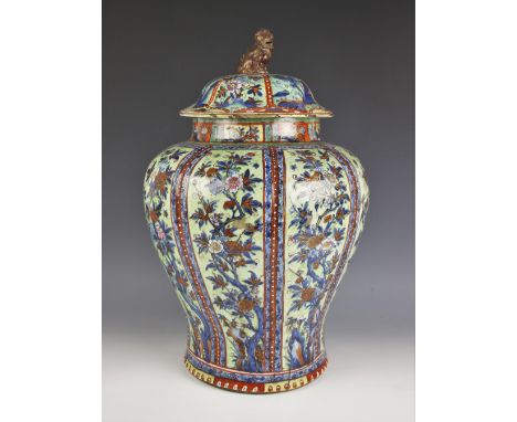 A Chinese porcelain temple jar and cover, Kangxi (1661-1722) the high shouldered vase of ginger jar form, externally decorate