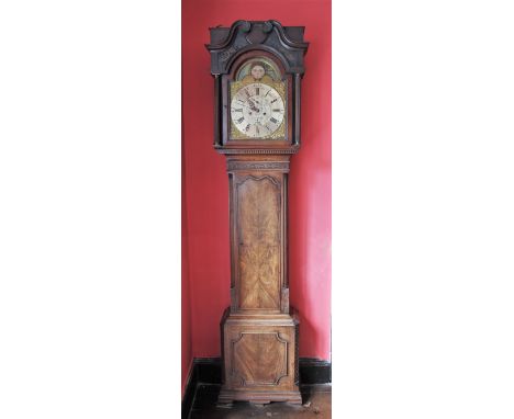 * A George III mahogany cased eight day longcase clock, signed Read, Tarporley, the moulded twin swan neck pediment with flow