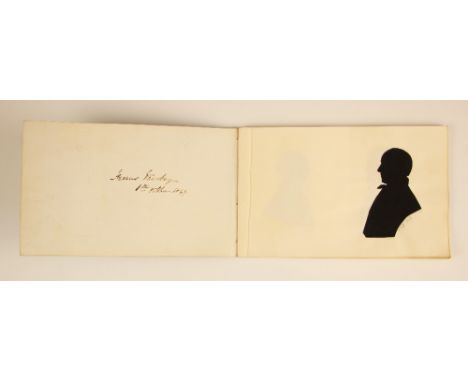 * A Victorian notebook containing seven pasted-in bust length papercut portrait silhouettes, depicting a lady and six gentlem