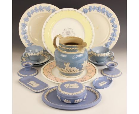 A selection of Wedgwood Embossed Queens Ware, comprising: two teacups, three saucers and four dinner plates, printed mark to 