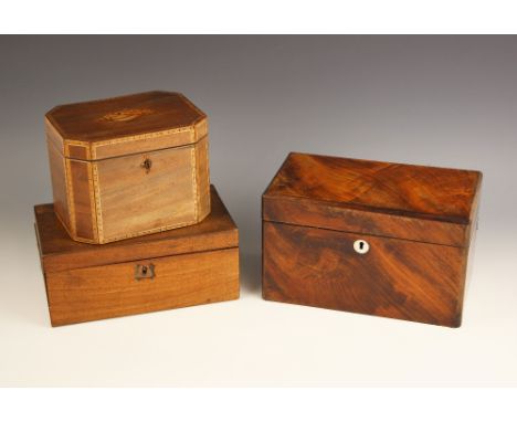 A 19th century mahogany stationery box, the hinged cover centred with a brass cartouche and opening to a compartmentalised in