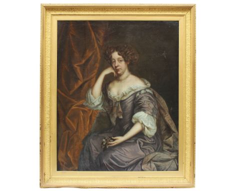 Follower of Sir Peter Lely (British, 1618-1680),Half length portrait of Sarah Darrell (1693-1761) seated holding a posy,Oil o