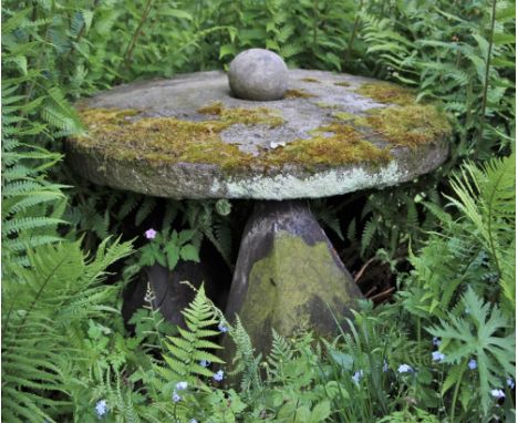 * A sandstone trough, supported on three triangular capitals, 74cm D 