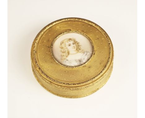 A French gilt brass circular powder box, late 19th century, with removable cover with portrait miniature to centre, the portr