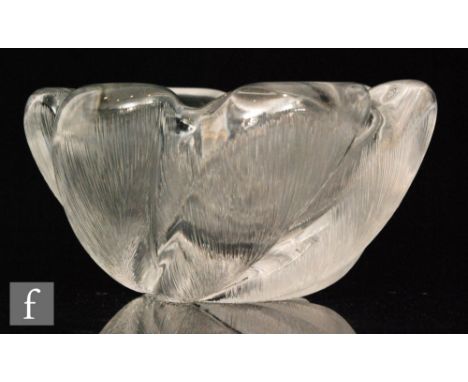 Edvin Ohrstrom - Orrefors - A 1940s glass bowl of wrythen lobed form, engraved with a feather design to the entirety, height 