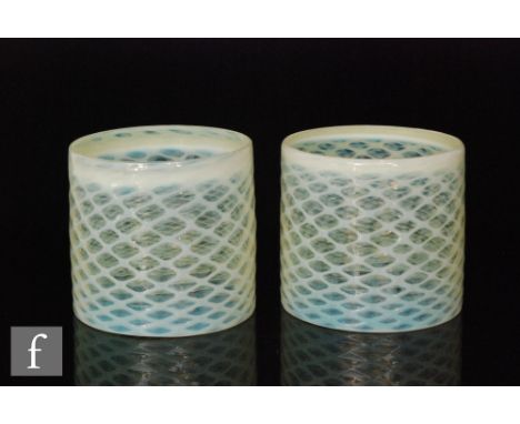 Unknown - A pair of early 20th Century cylindrical light shades decorated with a straw opalescent lattice design, height 14.5