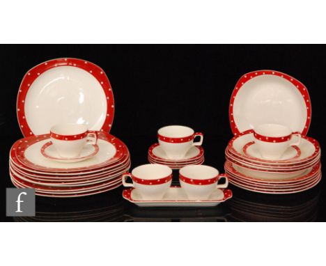 Jessie Tait - Midwinter Stylecraft - A collection of assorted tea wares in the Domino pattern with red bands and white polka 