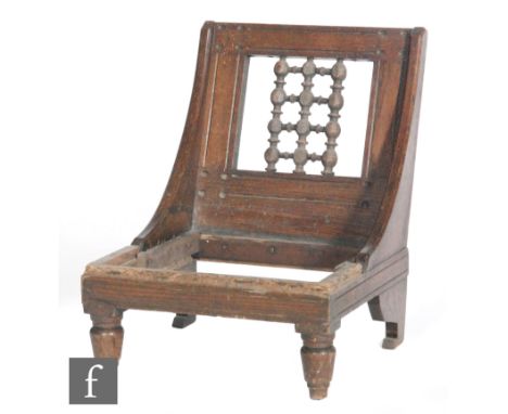 Attributed to Dr Christopher Dresser for The Art Furnishers' Alliance - An oak side chair of Moorish influence circa 1880, wi