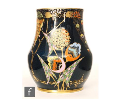 Carlton Ware - A 1930s Art Deco vase decorated in the Devil's Copse pattern with stylised gilt and enamel flowers against a b