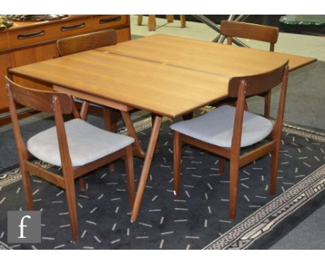 Bendt Winge - A post war Norwegian teak metamorphic table together with a married set of four arch back chairs.