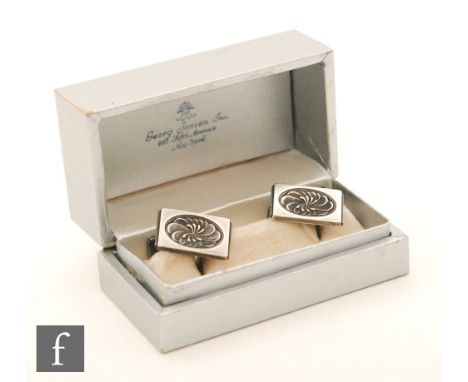 Georg Jensen - A pair of Danish silver pattern 95 rectangular swivel cufflinks with stylised flower head to centre, boxed. 