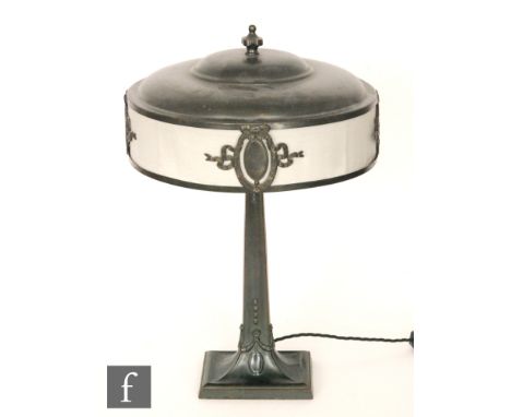 Unknown - A continental bronzed table lamp, swept rectangular base rising to tapering column with swag details below circular
