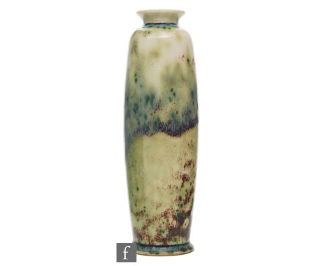 Ruskin Pottery - A high fired vase of rolling pin form decorated in a celadon green with a lavender sweeping curtain with cop