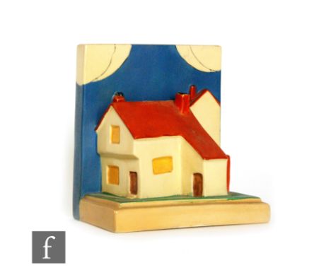 Clarice Cliff - Cottage - A shape 410 book end circa 1932 hand painted in enamel colours, script mark, height 14cm, restored.