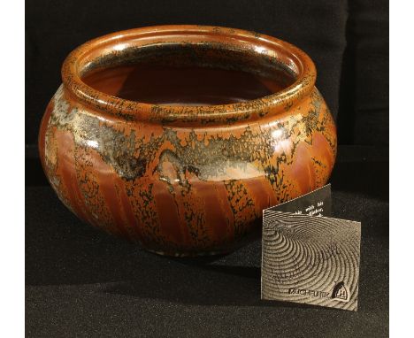 Studio pottery - a John Leach bowl, in brown and black glazes, 13cm high 