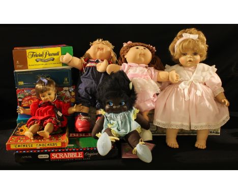 Toys - a Cabbage Patch Doll, another; a Zonka Barbados doll; a Fiba Collection Judith doll, boxed; board games, Trivial Pursu