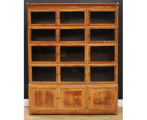 An early 20th century Globe Wernicke style modular stacking 'solicitor' library bookcase or collector's cabinet, by Minty, Li