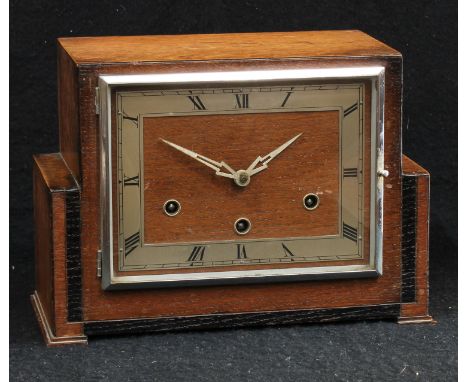 An Art Deco oak Westminster chime mantel clock, rectangular dial, silvered chapter ring, Roman numerals, three winding holes,