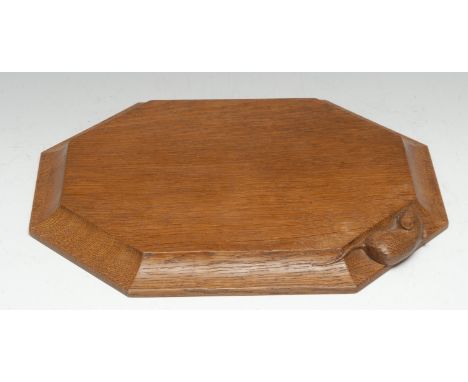 Robert Thompson, Mouseman of Kilburn - an octagonal bread board, lightly adzed, carved mouse signature, 30.5cm wide 