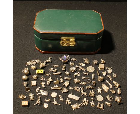 A selection of sterling silver and other silver charms, church, bells, binoculars, dog, mouse, Bible, 10 shilling note, St. P