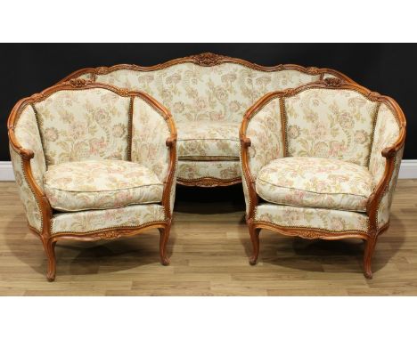 A Louis XV style three piece drawing room suite, comprising sofa and a pair of tub chairs, stuffed-over upholstery, squab cus