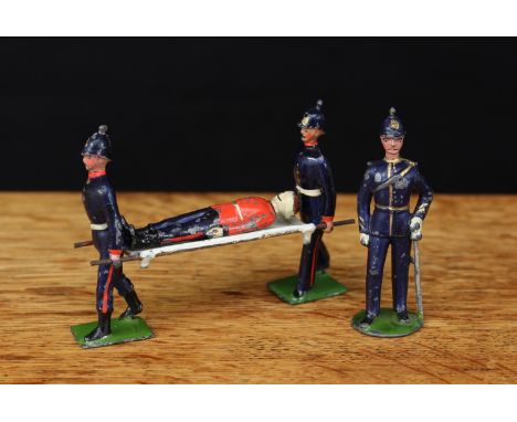 W Britain (Britains) Royal Army Medical Service figures, comprising Medical Doctor, oval base and a pair of stretch bearers w