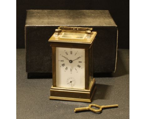 A French lacquered brass carriage clock, by L'Epee, white dial, Roman and Arabic numerals, subsidiary seconds dial, swing han