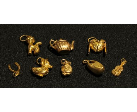 A selection of 9ct gold charms, teapot, clog, jacket, cat, duck, guitar, Koala, wishbone, marked 375, 12.7g (8) 