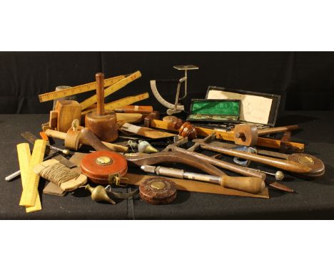 Tools- Chestermann tape measure;  others, similar;  plum bob;  Holbro London folding ruler;  George Barnsley adn Sons, Sheffi