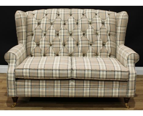 A Marks &amp; Spencer Highland button back wingback sofa, 101cm high, 144cm wide, the seat 110cm wide and 51cm deep 