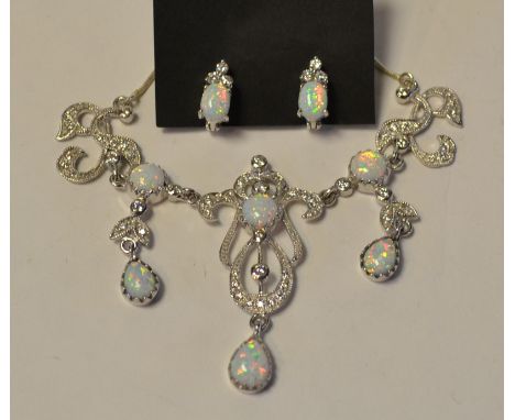 A silver and Gilson opal necklace, a pair of similar stud earrings (2) 