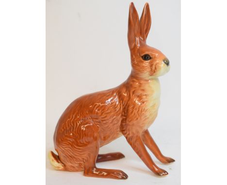 A Beswick Hare, seated, 1025, cracked, gloss Condition report Report by NG

There is a crack running from the right hand side