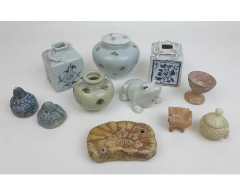 A group of Chinese Song dynasty and later stoneware and porcelain, comprising a Ming style stoneware water dripper (with rest