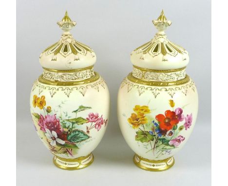 A pair of modern Royal Worcester blush ivory potpourri vases and pierced covers, decorated in ?Victorian Flower Sprays? after