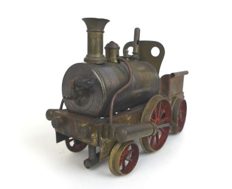 A live steam spirit fuelled 2-2-2 locomotive, possibly Stevens Model Dockyard or similar with twin rear mounted oscillating c