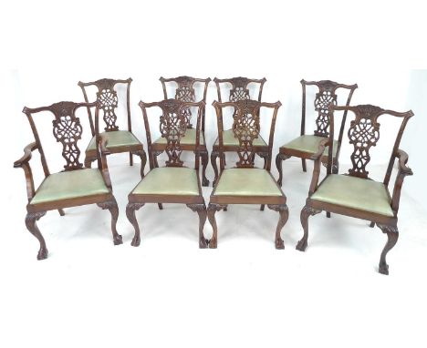A set of Edwardian Chippendale style eight dining chairs including two carvers, with decorative top rails, pierced carved bac