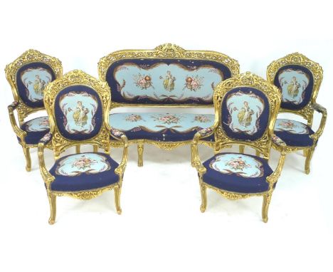 A modern French 19th century style salon suite, with carved and gilded wood frames, tapestry upholstered seats and backs, com