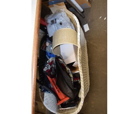 A wicker carry cot and assorted household contents