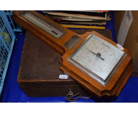 Mid 20th Century barometer and a wooden storage box