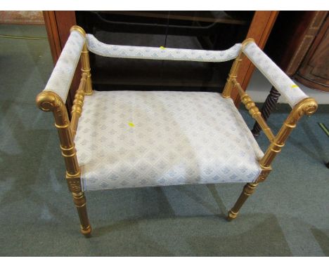 NEO CLASSICAL, gilt bench seat, tapering fluted legs with foliate carved arm supports, 59cm width 