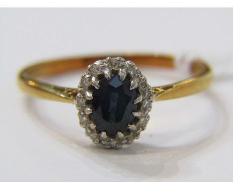 18ct YELLOW GOLD SAPPHIRE &amp; DIAMOND CLUSTER RING, principal oval cut multi claw set sapphire surrounded by accent brillia