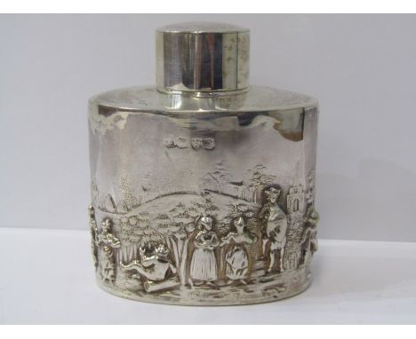 SILVER TEA CADDY, oval bodied silver tea caddy, decorated with continous scene of village life in high relief, makers JN &amp