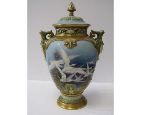 ROYAL WORCESTER SWAN VASE, a fine lidded pedestal vase decorated with Flying Swans in the style of Baldwin, with twin mask ha