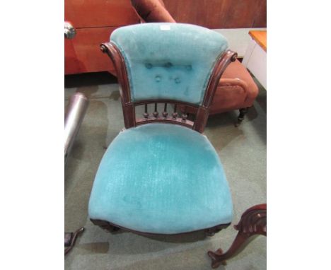 VICTORIAN NURSING CHAIR, 19th Century blue button back nursing chair with carved and spindle back detail, with original casto