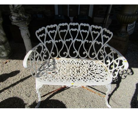 GARDEN FURNITURE, a cast metal 2 seater bench with ornate batton seat panel, 96cm width 